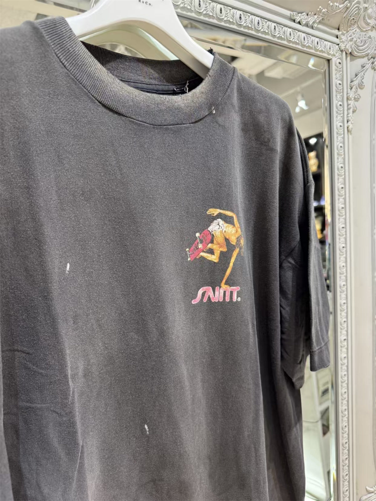 MSAINTM Skateboard-Riding Jesus Front and back Conley-style prints; washed, distressed, tubular-knit T-shirt.