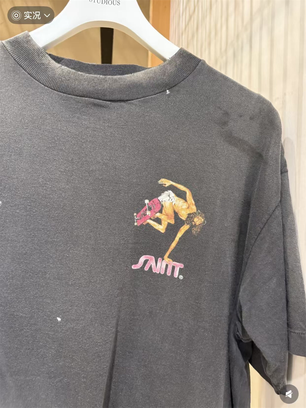 MSAINTM Skateboard-Riding Jesus Front and back Conley-style prints; washed, distressed, tubular-knit T-shirt.