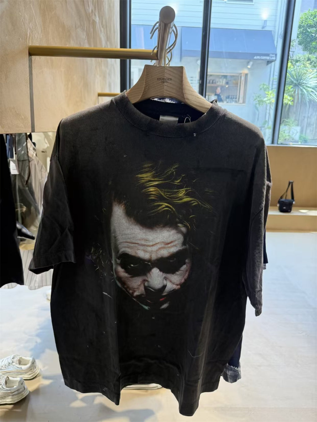 SAINT Mxxxxxx piece: Batman collaboration distressed T-shirt featuring a sun-faded gradient wash.