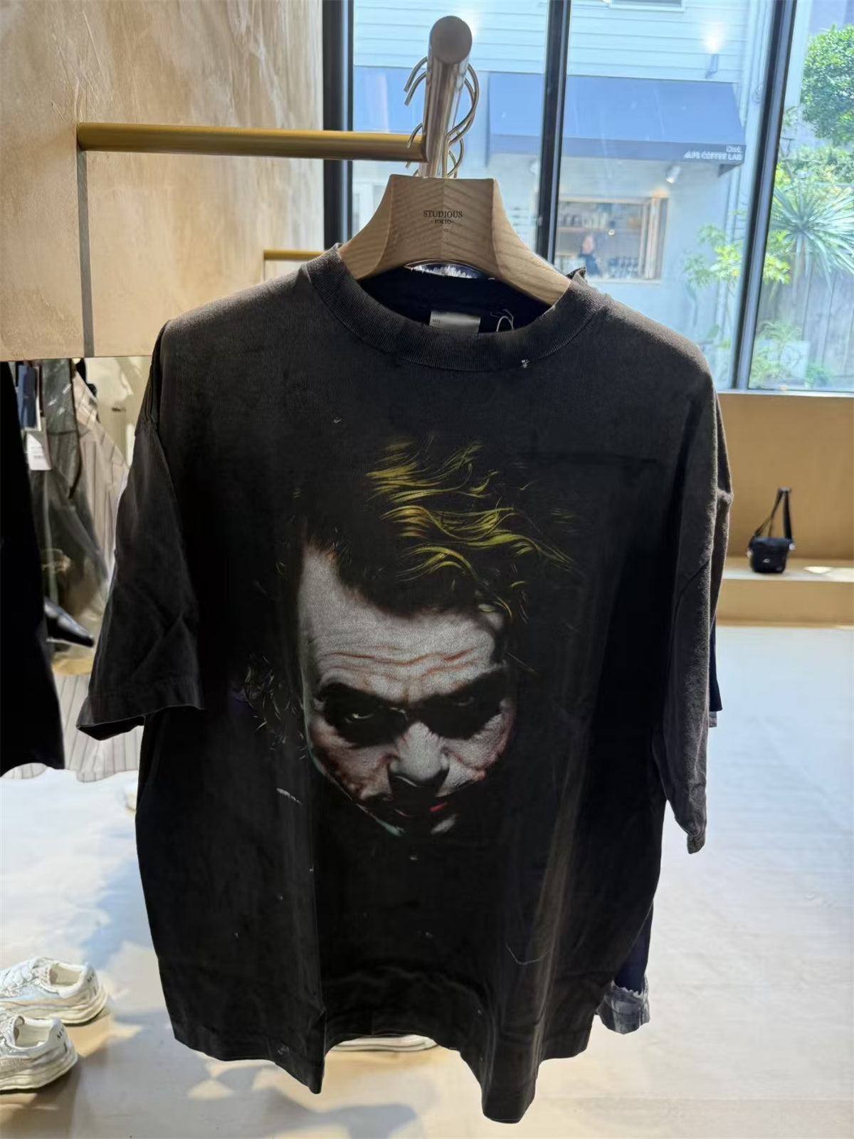 SAINT Mxxxxxx piece: Batman collaboration distressed T-shirt featuring a sun-faded gradient wash.