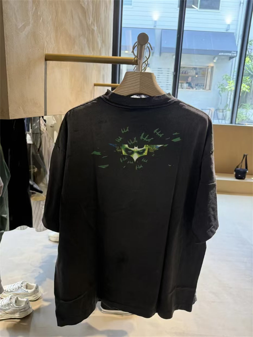SAINT Mxxxxxx piece: Batman collaboration distressed T-shirt featuring a sun-faded gradient wash.