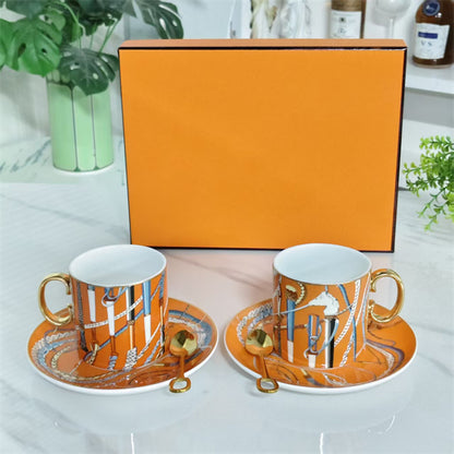 Cup and Saucer Set (Pair) + Original Spoons – Scepter Orange