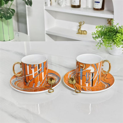Cup and Saucer Set (Pair) + Original Spoons – Scepter Orange