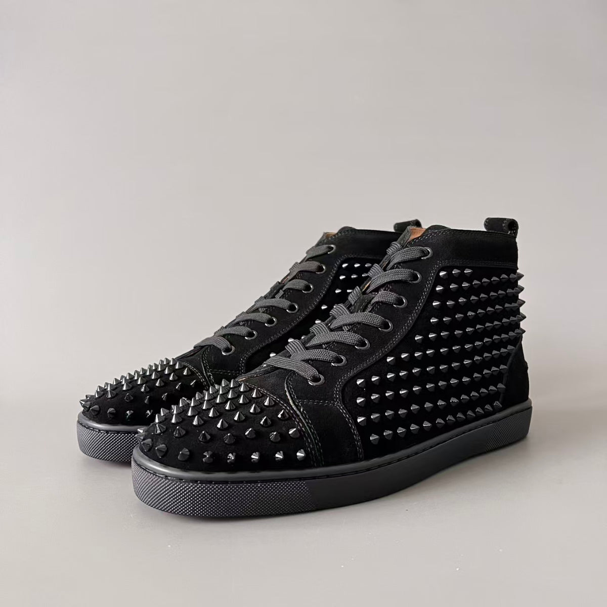 CL 【Red Sole】Lou Spikes high-top sneakers in all-black with studs.