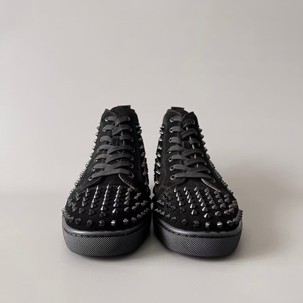 CL 【Red Sole】Lou Spikes high-top sneakers in all-black with studs.