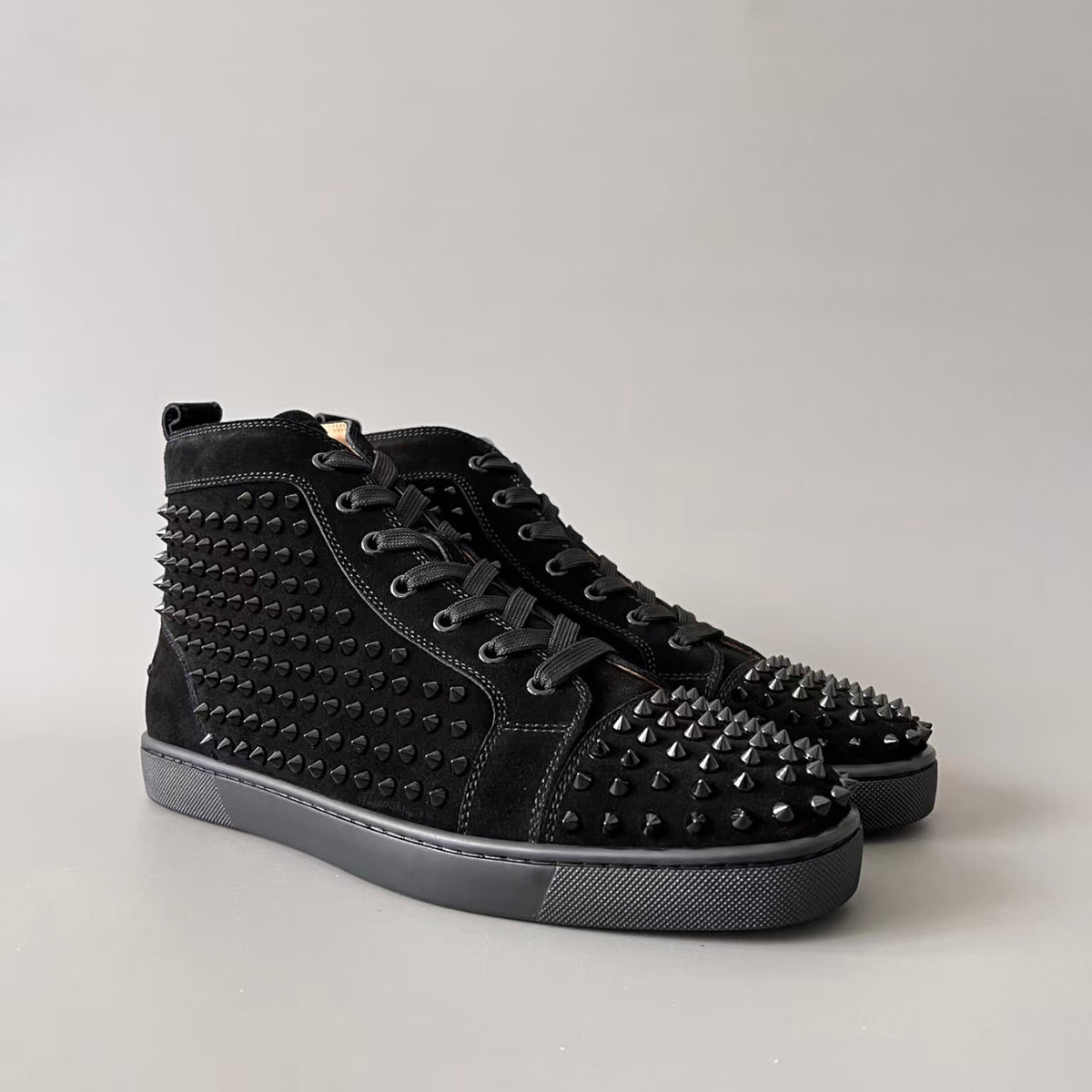 CL 【Red Sole】Lou Spikes high-top sneakers in all-black with studs.